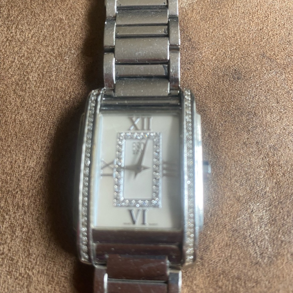 MOVADO ESQ DIAMOND DIAL AND BEZEL WATCH